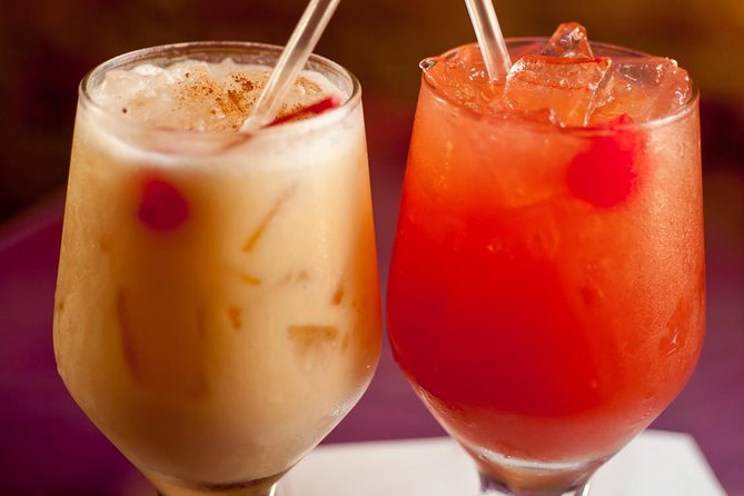 Flavors of St Thomas Walking Food Tour - Learning the Painkiller and other island drinks