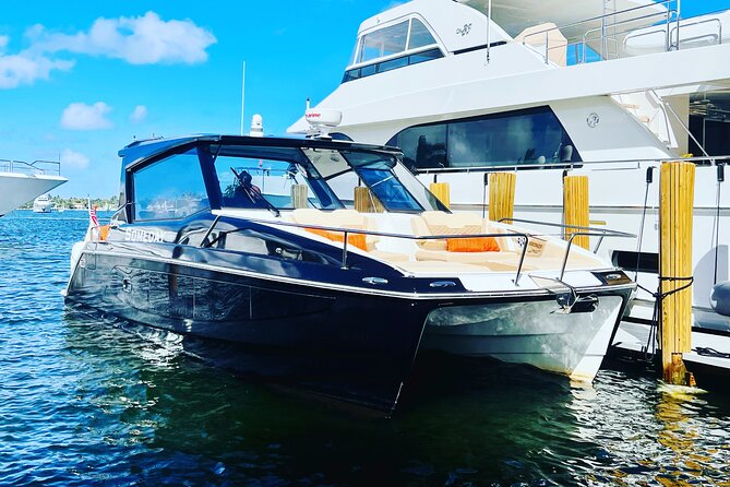 St. John Luxury Catamaran Turtle Snorkel and Cays Full Day - Boarding a modern Aquila catamaran at 9:30 a.m.